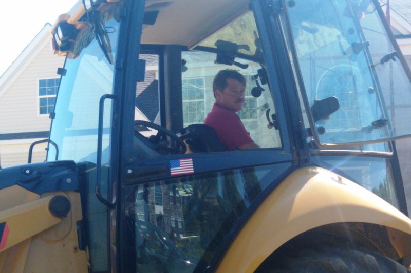 Operator in the cab of an excavator