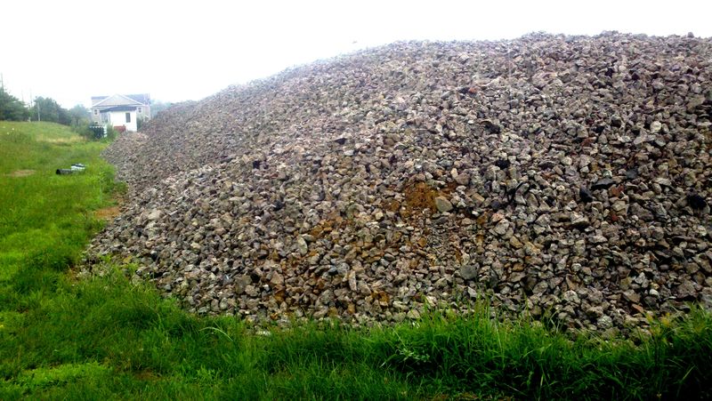 Large stockpile of rock on a job site