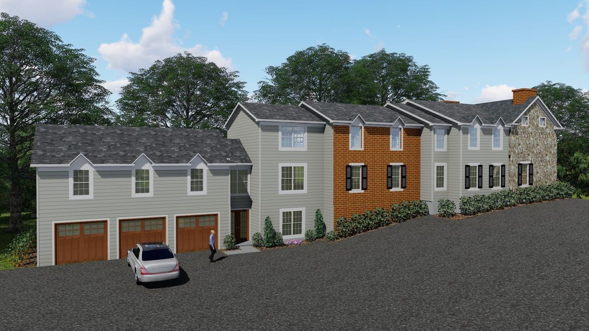 Rear left, with the 3-car garage